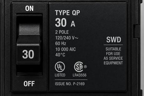 Close-up of a circuit breaker face plate showing the SWD marking